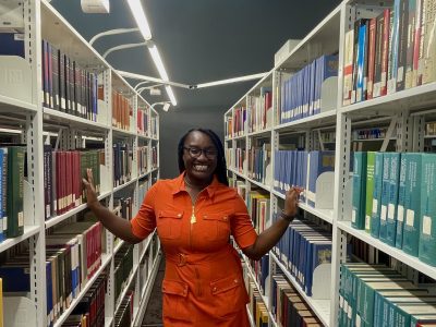 Photo of Sita Nyame in the National Renewable Energy Laboratory (NREL) library